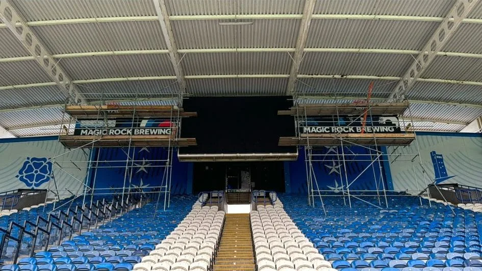 Scaffold towers inside a stadium stand