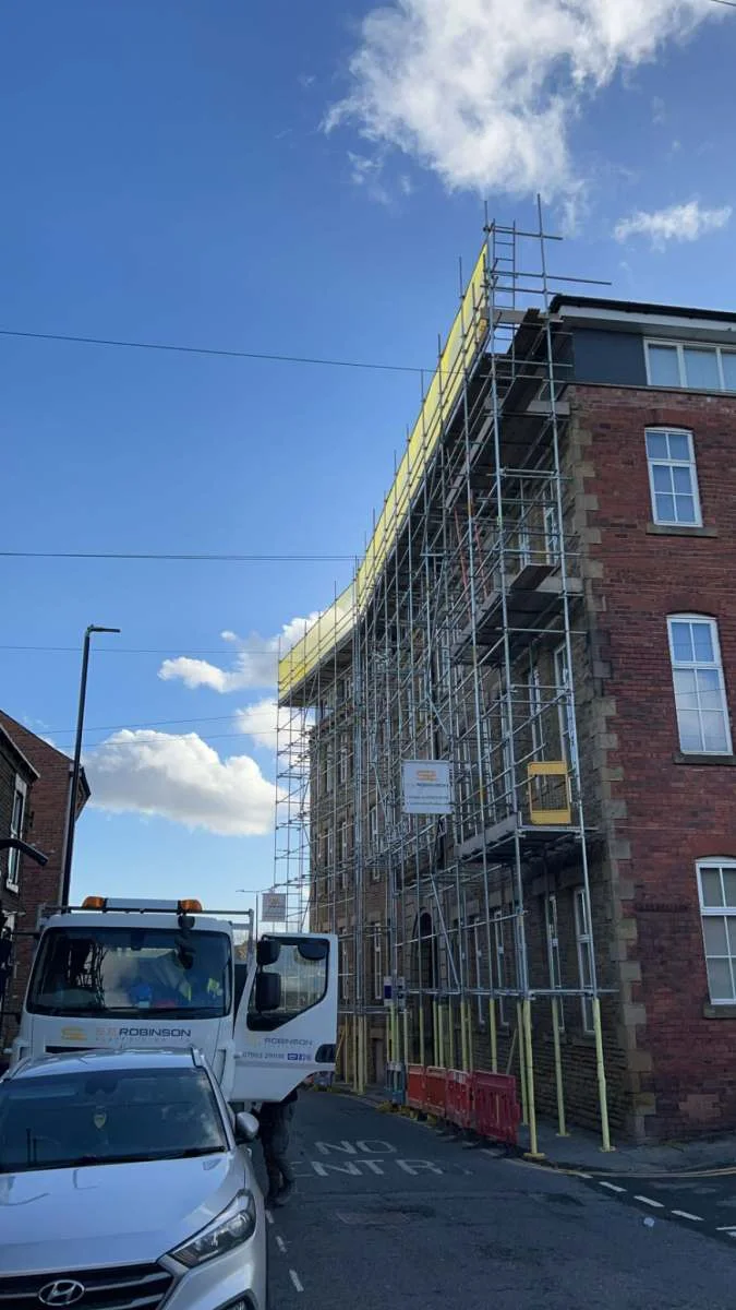 Scaffolding Services Huddersfield - street scaffold on a stone building